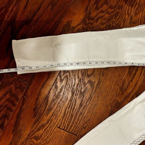 7 for all mankind white denim with braided embellishment on both legs. Size 25. - Picture 9 of 10